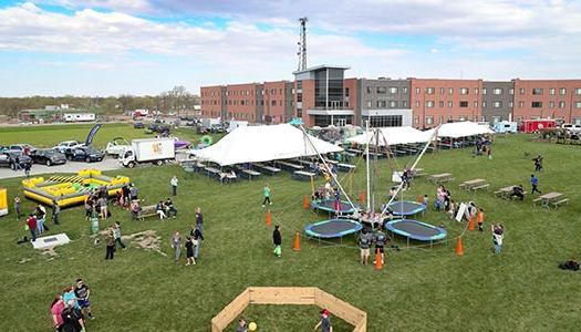 Students and Community at Celebrate Kearney event at University Village in front of Village Flats