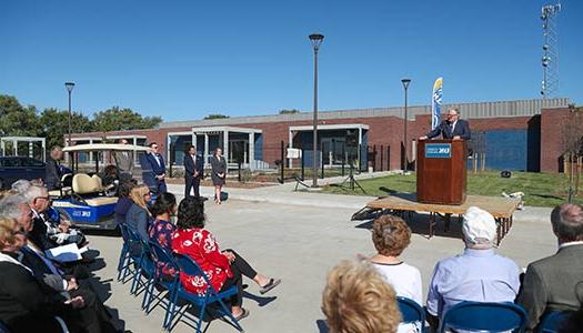 Students, Staff, Faculty, and community at the ribbon cutting for the Plambeck Center